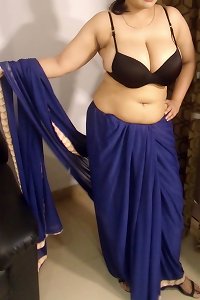 huge mounds Indian woman In Saree